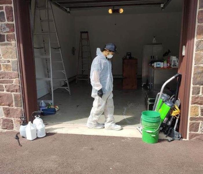 Team member wearing protective gear outside